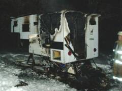 Camper fire caused by propane leak.